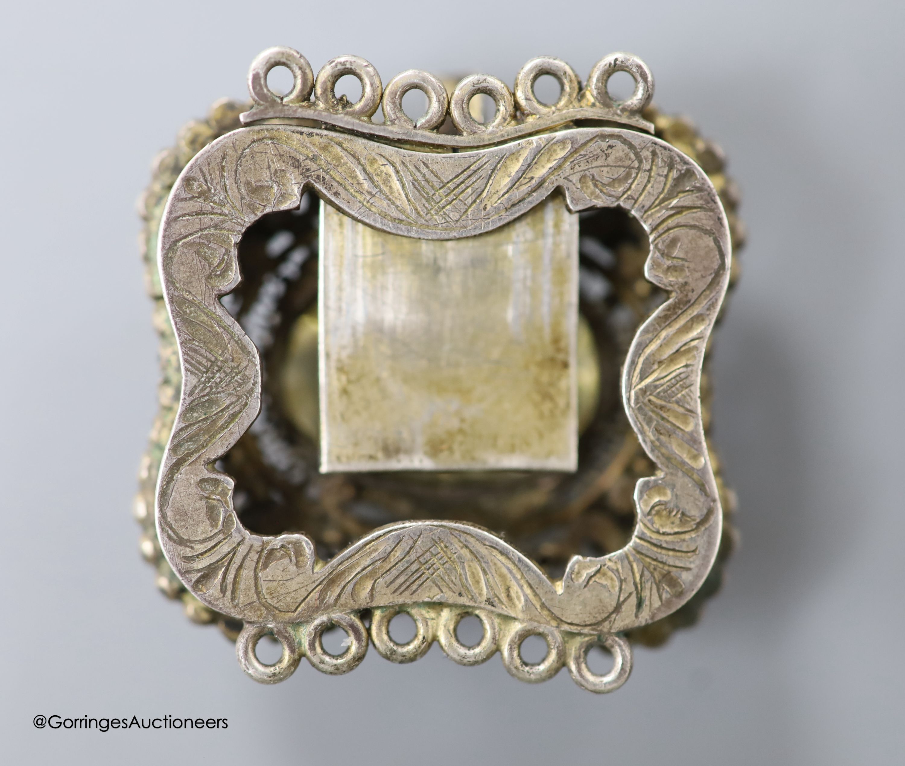 A Victorian yellow metal mounted glazed oval pendant, with miniature portrait of a young lady and plaited hair verso, 40mm, gross weight 18.1 grams, a yellow metal and tooth mounted stick pin and a gem set white metal cl